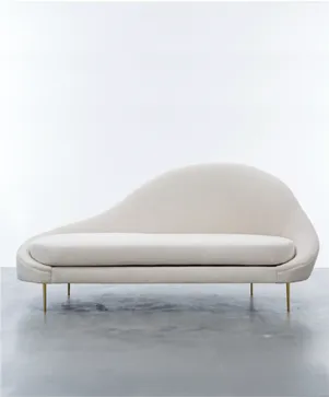 Custom curved cream velvet chaise lounge furniture piece with slim gold brass legs for luxury residence