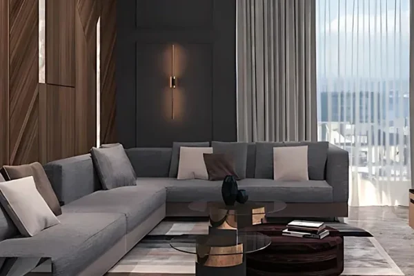 Modern luxury living room interior at DLF The Camellias Gurgaon featuring L shaped grey sectional sofa bespoke geometric wood wall paneling and bronze coffee table